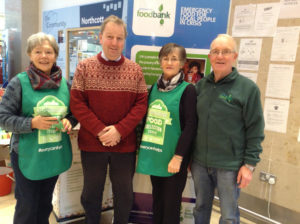 Danny Kinahan called in to support his constituents Iris and James Forsythe along with Flo Burns as they volunteered during the Christmas Food collections.
